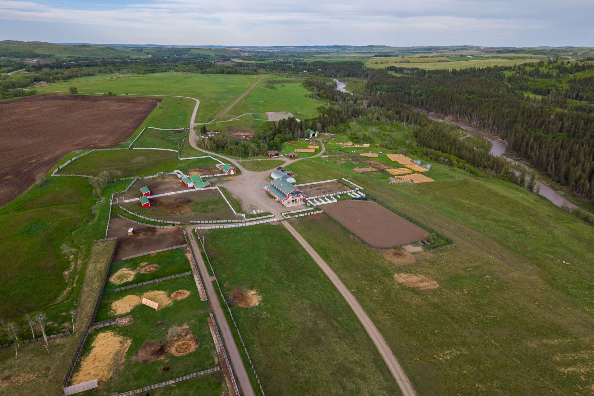Aerial of the Sheep River valley and ranch yard